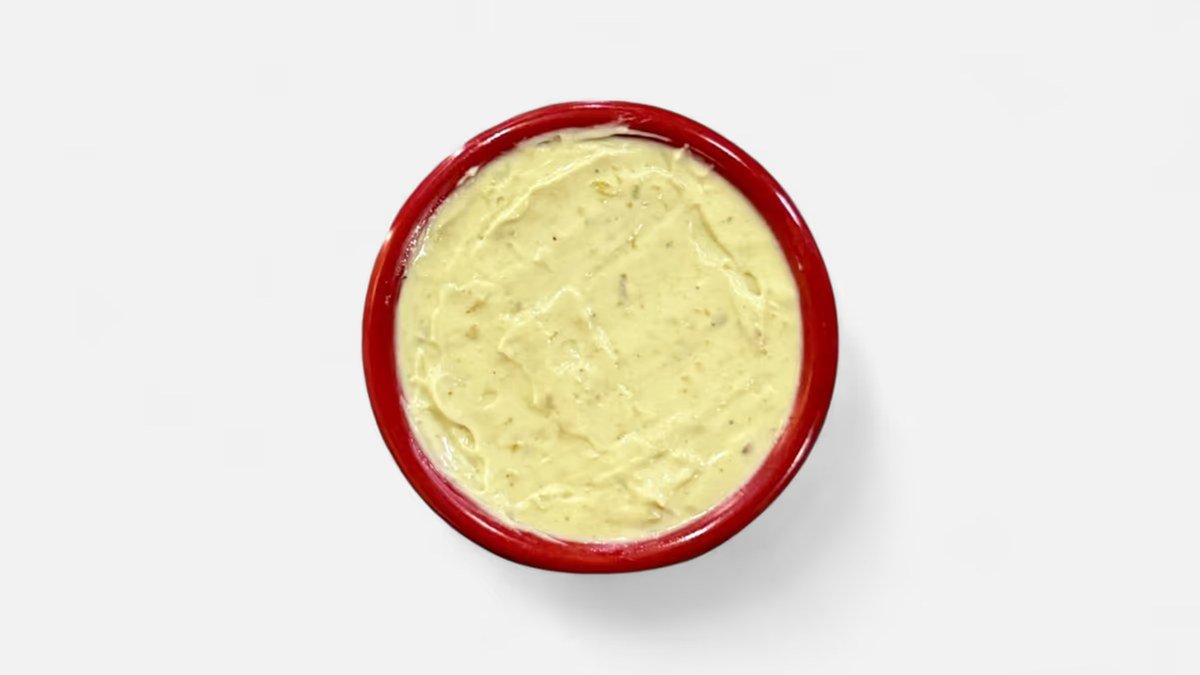 Pesto mayo in a red ramekin